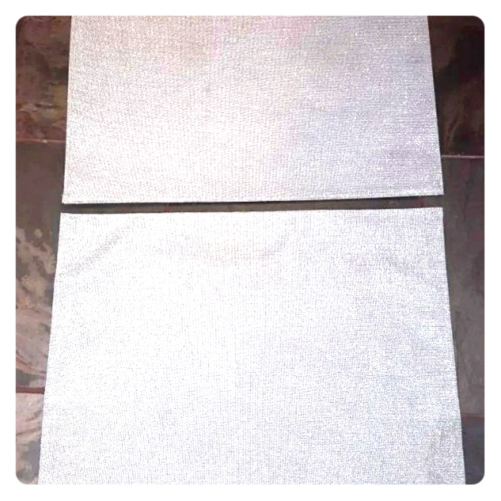 2 metallic silver placemats for table